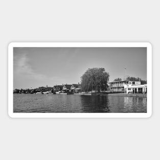 Waterside properties on the River Bure in the Norfolk village of Horning Sticker